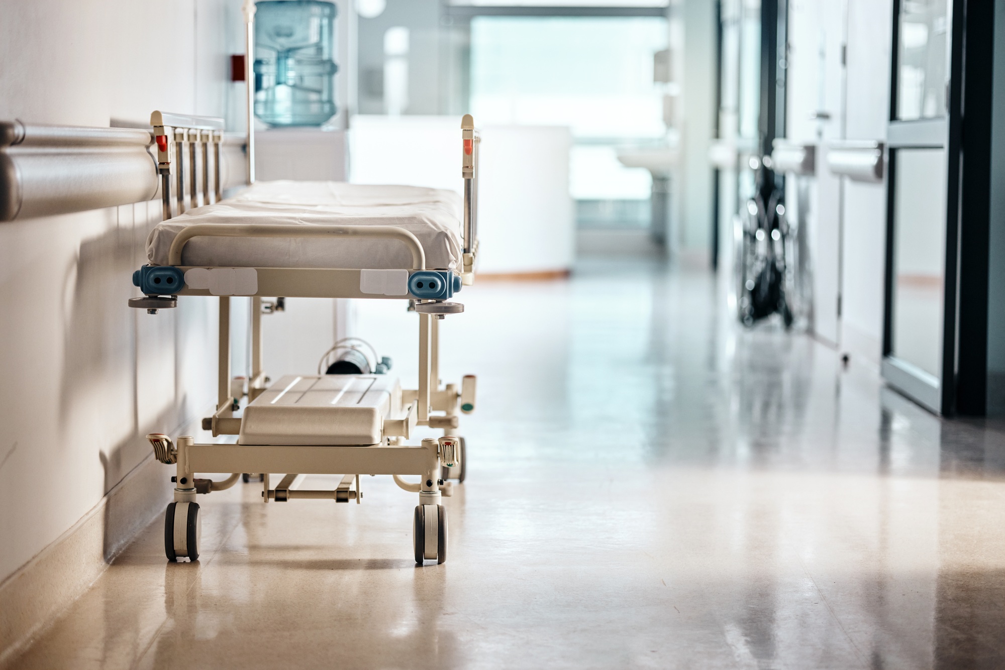 Ward, hospital and bed in a lobby, healthcare or wellness with furniture or ergonomics with help or